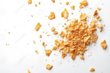 Scattered crumbs of vanilla chip butter cookies on white background close-up macro photography