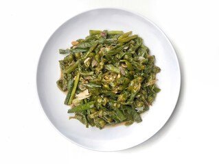 Stir-fried genjer (sawah lettuce) or Indonesian typical food on plate