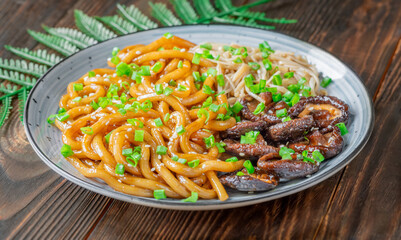 Udon Noodles with Soy Unagi Sauce, Mushrooms, and Green Onion