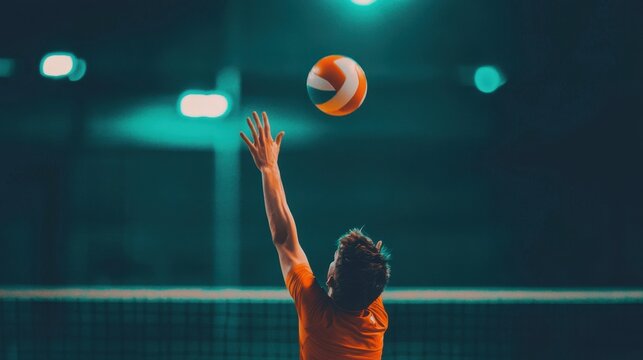 Energetic Young Athlete Serving Volleyball in Indoor Sports Arena Under Dramatic Lighting Effects at Night