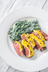 Cheese topped beef steak