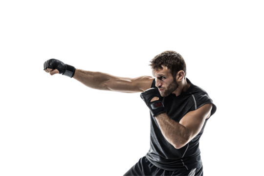 A determined martial artist in black workout gear delivers a powerful punch. His clenched fists and focused gaze show intense concentration, speed, isolated on a transparent background