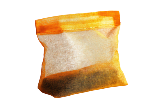 Golden treasure softly glowing within a sheer fabric bag an ethereal light source shines on a black backdrop