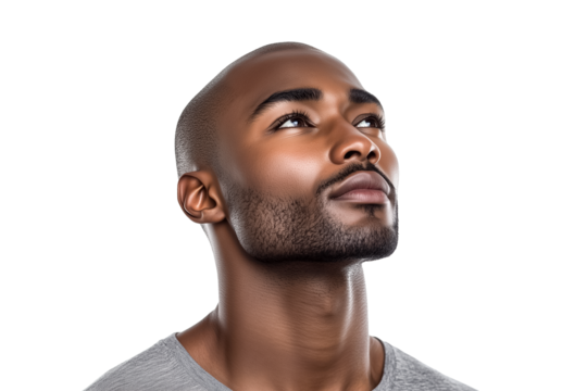 A confident young african american man looking up with a hopeful expression isolated on a transparent background. PNG file.