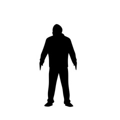 Obraz premium Silhouette of Mysterious Hooded Figure in Shadowy Stance for Graphic Design