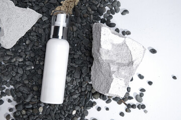 Minimalist Skincare Bottle on Stone with Empty Space