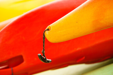 Kayaks in stack outdoors