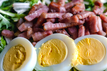 Dandelion salad with hard-boiled eggs and bacon, diuretic, vitamin, healthy food