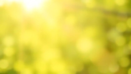 Obraz premium Abstract sunny spring background with vibrant green bokeh light effects