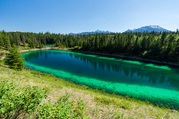 The Third Lake of Valley of the Five Lakes. Tranquil Turquoise Lake in Jasper National Park,...
