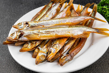 smoked capelin fish sprat vegetables dish fresh delicious gourmet food background on table rustic food top view copy space pescetarian diet