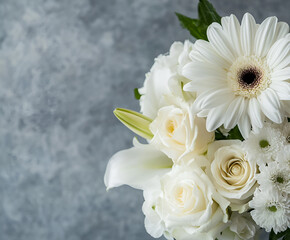Obraz premium White flowers, roses, lily, gerbera over grey background. Selective focus, Space for text