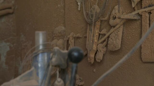 A variety of Woodworking Chisels delicately placed on a well-organized Workbench surface