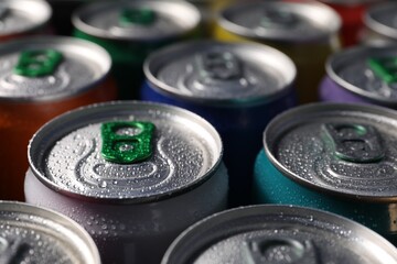 Many aluminium cans of beverage as background, closeup