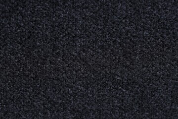 Texture of black woven fabric as background, top view