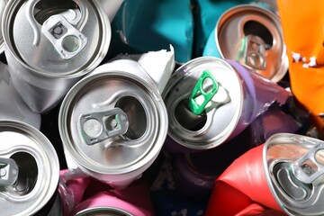 Many crumpled tin cans as background, closeup