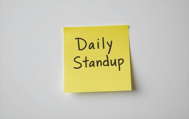 Yellow sticky note with Daily Standup written on it on white background, Daily Standup written on Yellow sticky note, business or office note reminder for daily standup