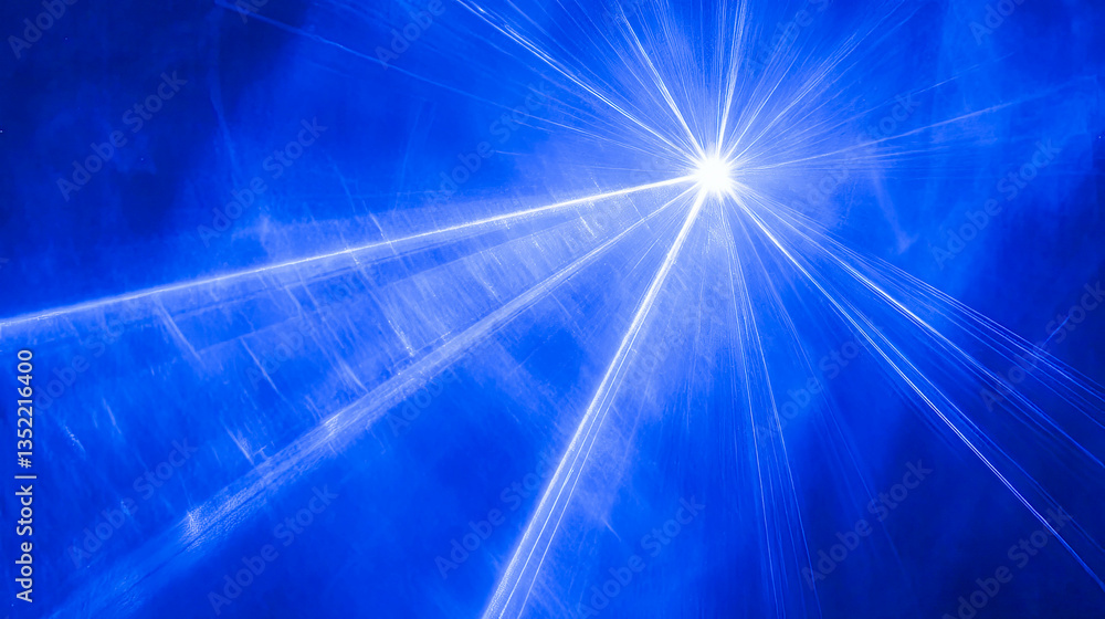 Poster bright blue beams illuminate a dark space in a surreal display of color and brilliance