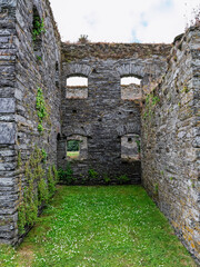 Explore the remnants of Arundell Grain Store, with its weathered stone walls and grassy interior....