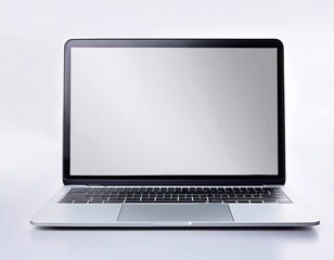 Modern silver laptop showing blank screen on white background
