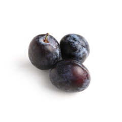 Obraz premium Ripe plums on white background