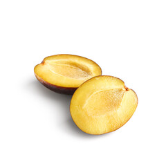Halves of ripe plum on white background