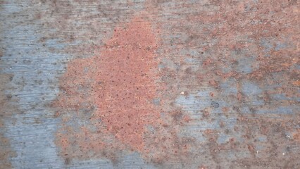 Rust on the iron door for the background. old peeling paint on rusty grates. Rusty metal texture.
