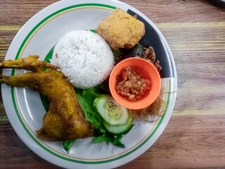 Indonesian Food Menu Photos For your food and beverage business.
Fried duck with spicy sambal.