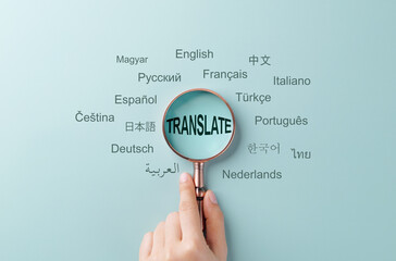 Translation and multilingual communication concept. A magnifying glass focus on word 