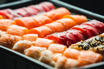 Set of sushi rolls with shrimp, salmon, tuna