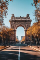 Obraz premium A beautiful urban street leading toward a large archway monument