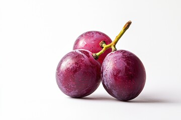 Obraz premium three red grapes on a white background 