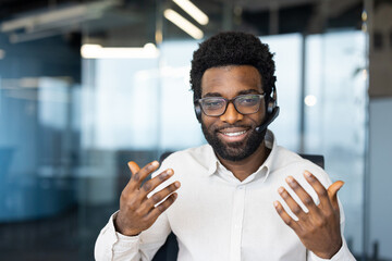 A cheerful, friendly face of a customer service representative with a headset, ready to help and provide support in a modern office setting.