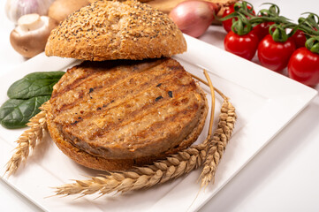 Make burger buns with vegan or vegetarian patties or burgers made from grains, vital wheat gluten food, grilled healthy food