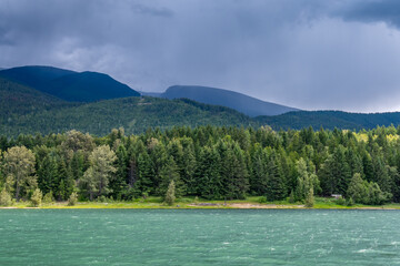 Fototapeta premium Mountain Lake with Dramatic Clouds in Vancouver, Canada, North America. Day time on June 204.