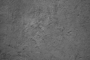 gray background, photo shows texture of gray wall