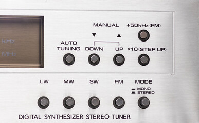 Obraz premium Vintage Digital Radio Tuner with Signal Strength Display in Stylish Metallic Finish