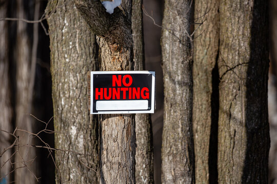 No hunting sign nailed to a Wisconsin tree