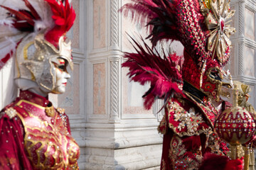 Venice, Italy - People dressed in carnival masks are photographed by tourists in the scenery of the...