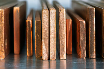 Copper bus bar arranged in a row, products of the non-ferrous metal industry