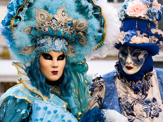 Venice, Italy - People dressed in carnival masks are photographed by tourists in the scenery of the...