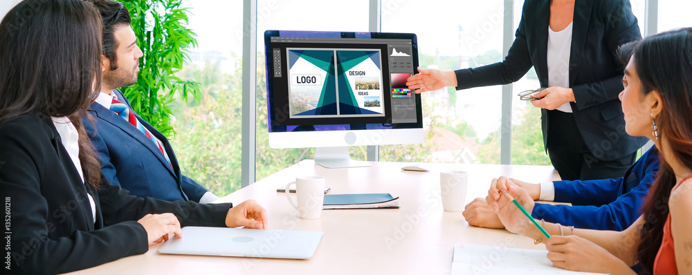 Poster graphic designer software for modern design of web page and commercial ads showing on the computer s