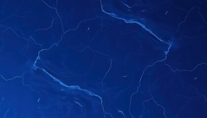 Deep midnight blue marble texture with subtle swirling patterns, smooth and polished surface, calm, rich
