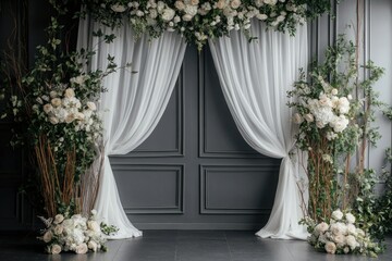 Elegant floral arrangement with drapes against a painted wall
