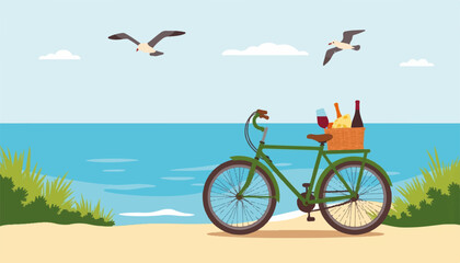 Fototapeta premium Minimalist green bicycle with picnic basket by coastal path, summer leisure