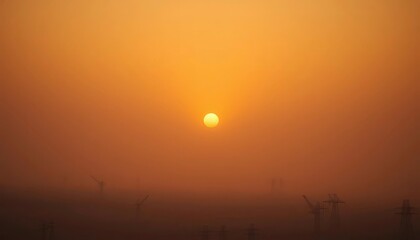 Fototapeta premium Smoggy, hazy orange sky obscuring sun, apocalyptic landscape, barren, hazy
