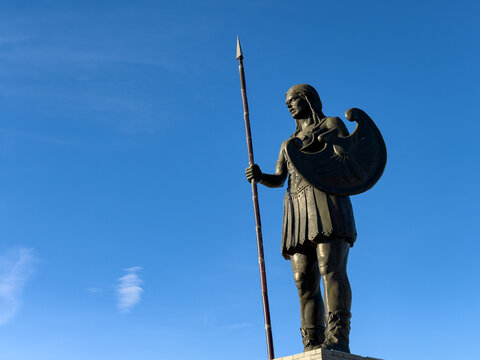 Bronze Amazon statue in Samsun Ilkadım district under a clear blue sky. Majestic Amazon warrior sculpture in village. Historical monument. Samsun, Turkey - Jan 6, 2024