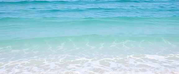 Obraz premium Tranquil emerald sea, gentle waves caress a pristine shore, serenity, beautiful