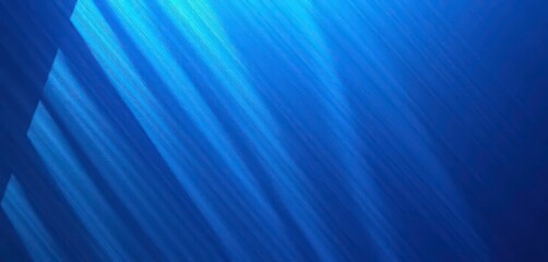 Diagonal lines etched into a cool, blue metallic surface cast dramatic shadows, diagonal, texture background