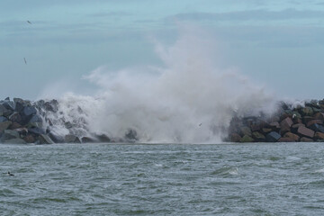 Stormy Sea: Waves and Rocks on Shoreline